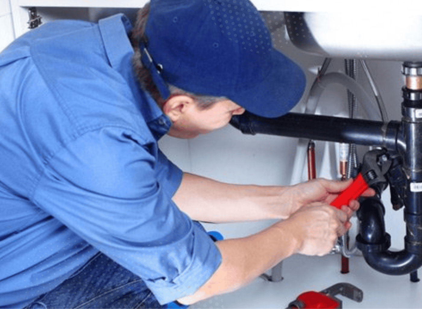 Licensed plumber repairing leaking pipe in Portage Indiana home