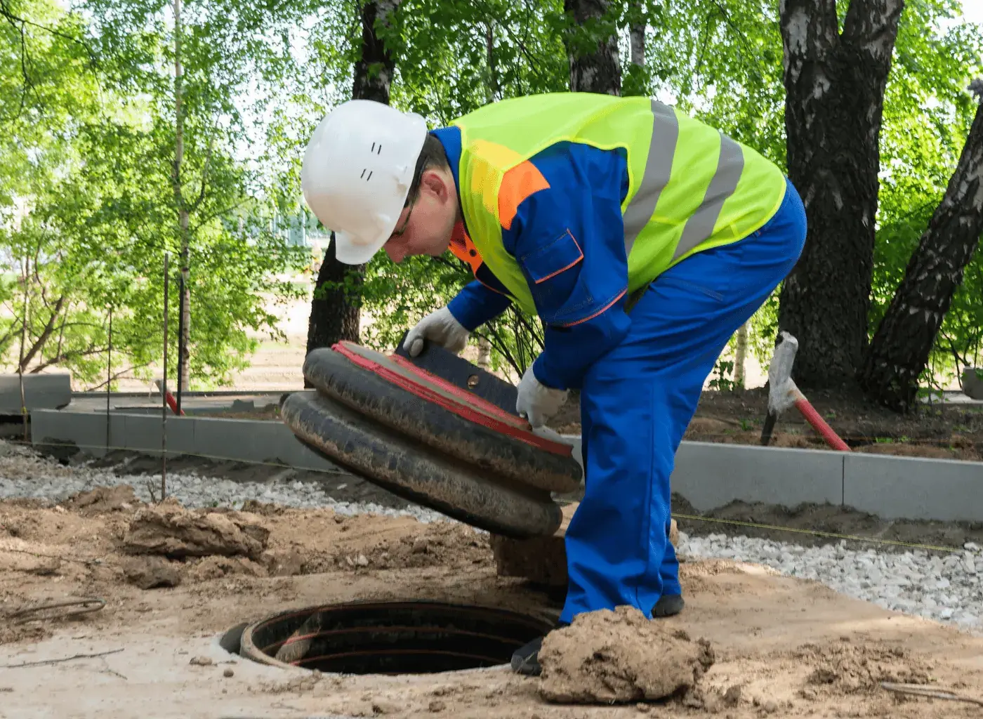 Licensed plumber testing sump pump discharge line